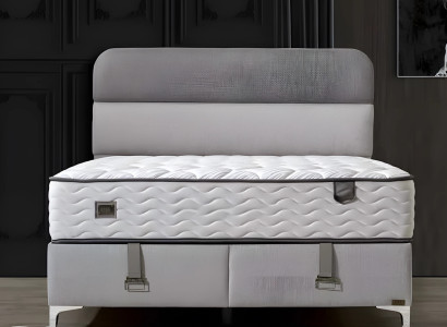 Elegantes weißes Bett mit Matratze aus Holz und Textil