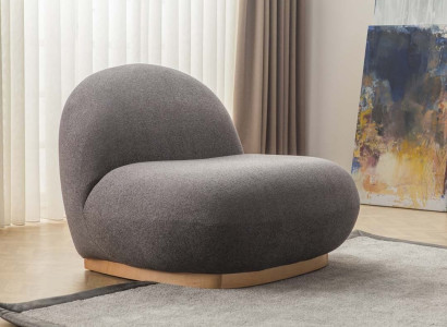 Harmonie im Interieur  sorgt der Sessel in stilvollem Design