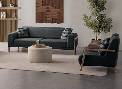 Inspirierendes Design: stilvolles Sofa und Sessel für einen gemütlichen Raum