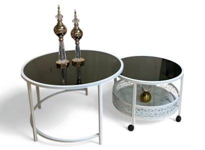 Zwei runde Couchtische mit schwarzer Glasplatte und verchromtem Gestell