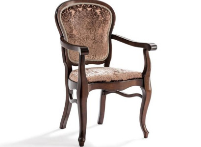 Eleganter Armstuhl mit Samtbezug und geschwungenen Holzbeinen