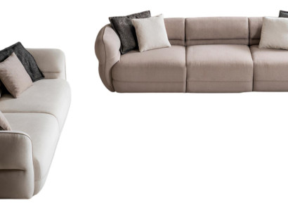 Moderne bequeme Sofakombination mit eleganten Linien und Kissen