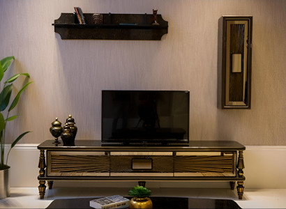 Luxuriöses TV-Sideboard mit glänzender Oberfläche und goldenen Akzenten